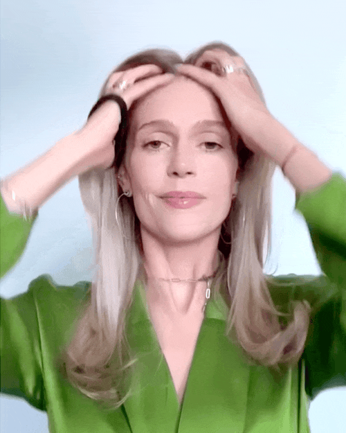 woman ties up her hair for ANSWR  flyaway control stick